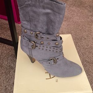 Grey booties with bronze studs on them super comfy